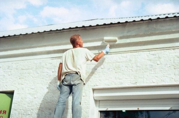 Self-painting the facade of the building