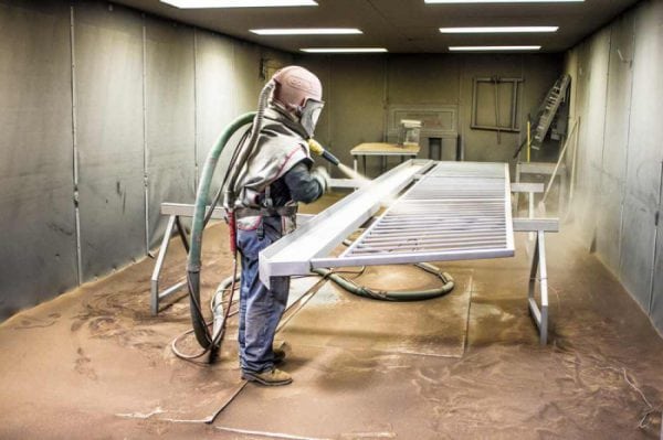 Sandblasting the surface