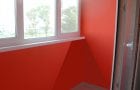 The walls of the balcony are painted red.