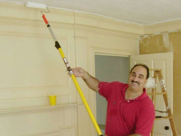 White ceiling with a roller