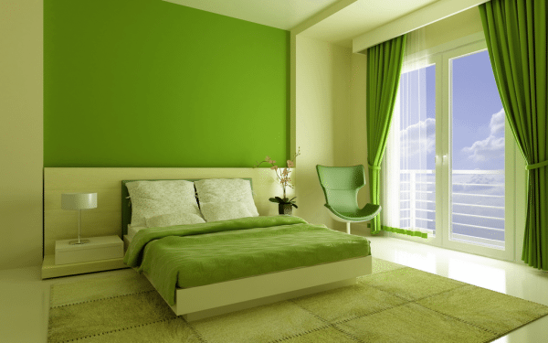 The ceiling and the walls in the bedroom are painted in delicate green.