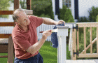 Painting the fence in white