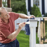 Painting the fence in white