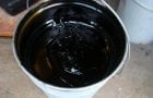 Bitumen primer in a bucket