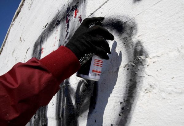 The process of drawing graffiti spray can