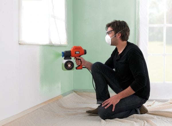 Painting the walls with a spray gun