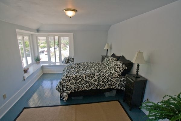 Painted wooden floor in the bedroom.