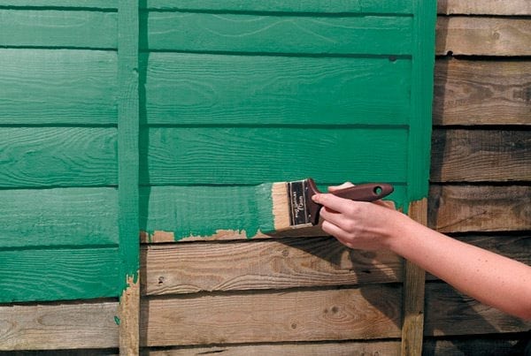 Painting wooden walls outside the house