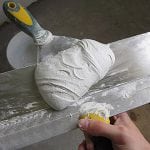 Putty mixture for concrete substrates