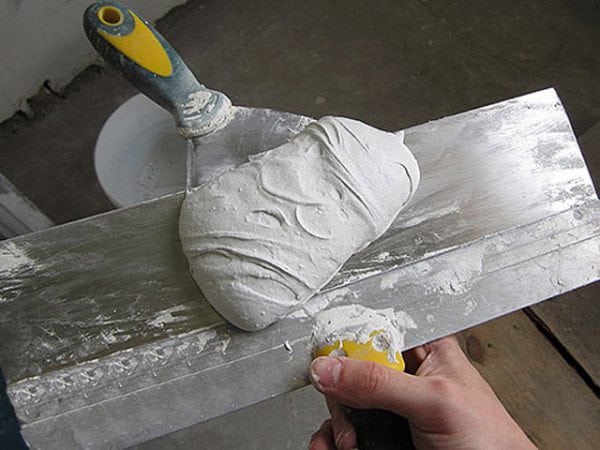 Putty mixture for concrete substrates