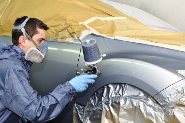 Application of enamel with a spray gun