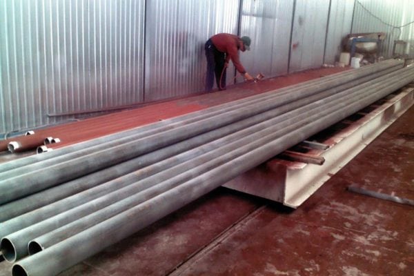 Application of primer XC-059 by spray gun