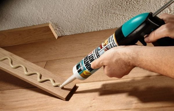 Fixing a wooden skirting board to liquid nails