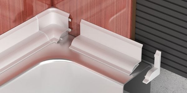 Installation of a plastic border for a bathtub