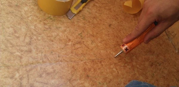 Sealing joints of linoleum