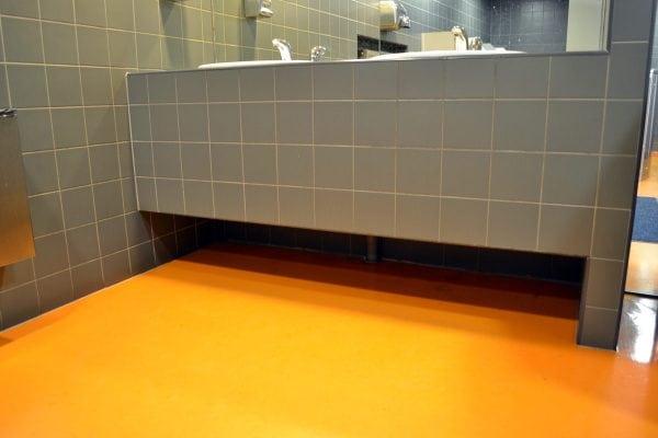 Orange epoxy bathroom floor