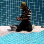 Tile adhesive for pools