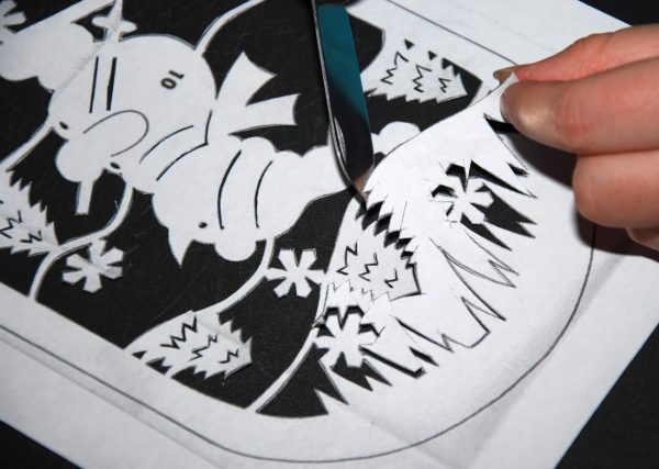 Preparing a stencil for New Year's drawing