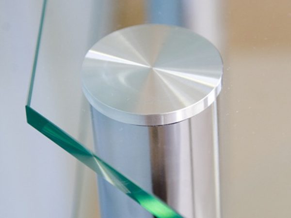 Glass bonding to metal