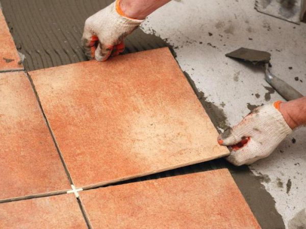 Mounting tiles on glue