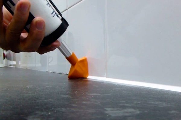 Sealant with nozzle