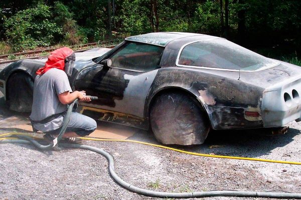 Sandblasting a car body