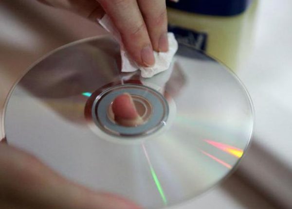 Removing a sticker from a CD