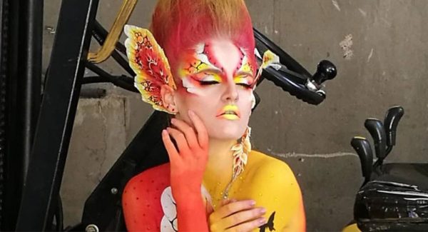 Body painting in red and yellow