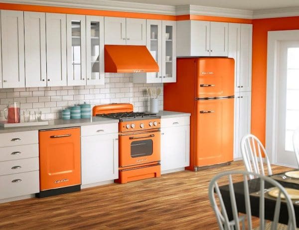 Orange household appliances in the interior of the kitchen