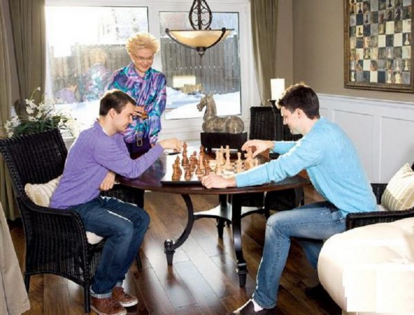 Elena Malysheva with her sons in a country house