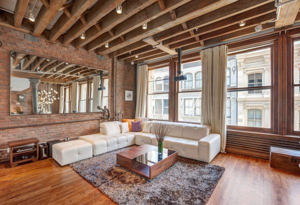 Wooden beams on the ceiling in the loft interior