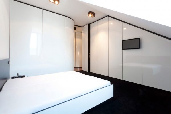 Glossy shiny surfaces visually expand the space of the room