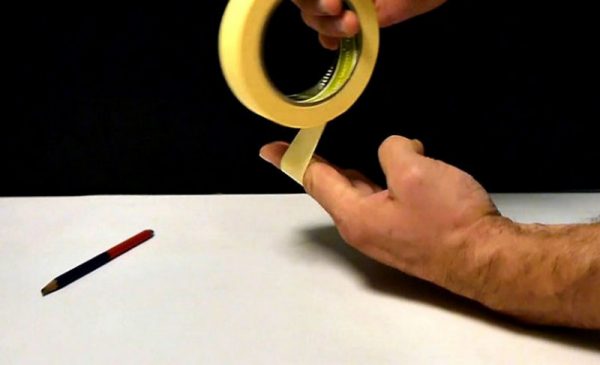 Using scotch tape when cutting