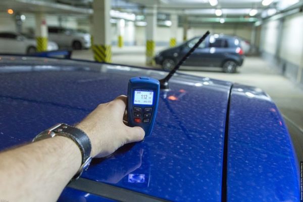 Measurement of a paint and varnish covering of the car