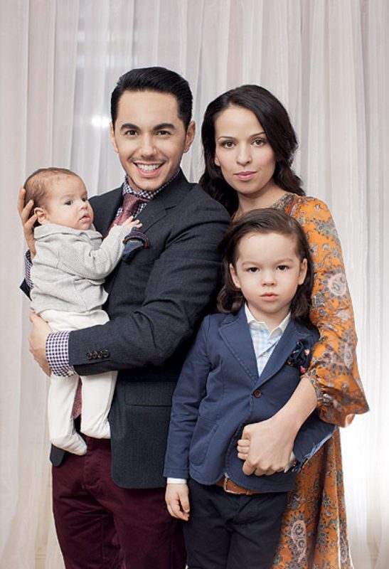 Timur Rodriguez with his wife and children