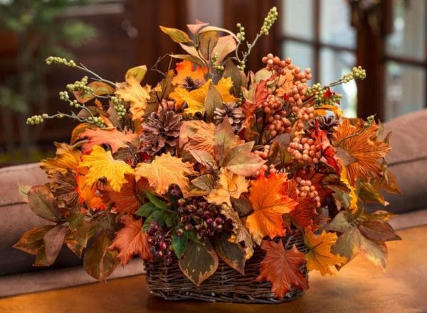 Knitted basket with autumn leaves