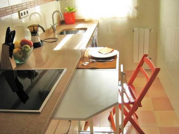 Multifunctional worktop for a small kitchen